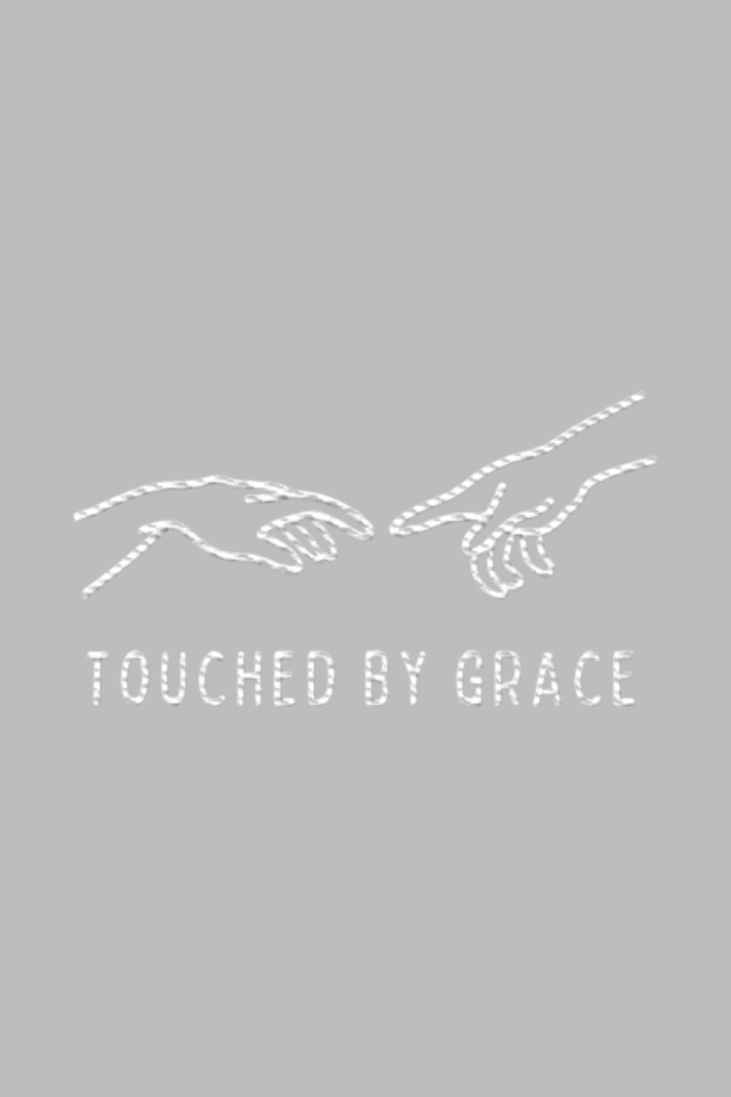 Stickmotiv Touched by Grace in Nahaufnahme - faire, nachhaltige Kleidung aus Bio-Baumwolle von Mission One More