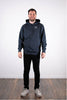 Model Ganzkörperaufnahme, Produkt Hoodie, Motiv Good God, Farbe India Ink Grey