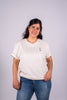Model Oberkörperaufnahme, Produkt T-Shirt, Motiv God is in her, Farbe Natural Raw