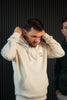 Model trägt Mission One More Hoodie ‚YHWH‘ aus hochwertiger Bio-Baumwolle